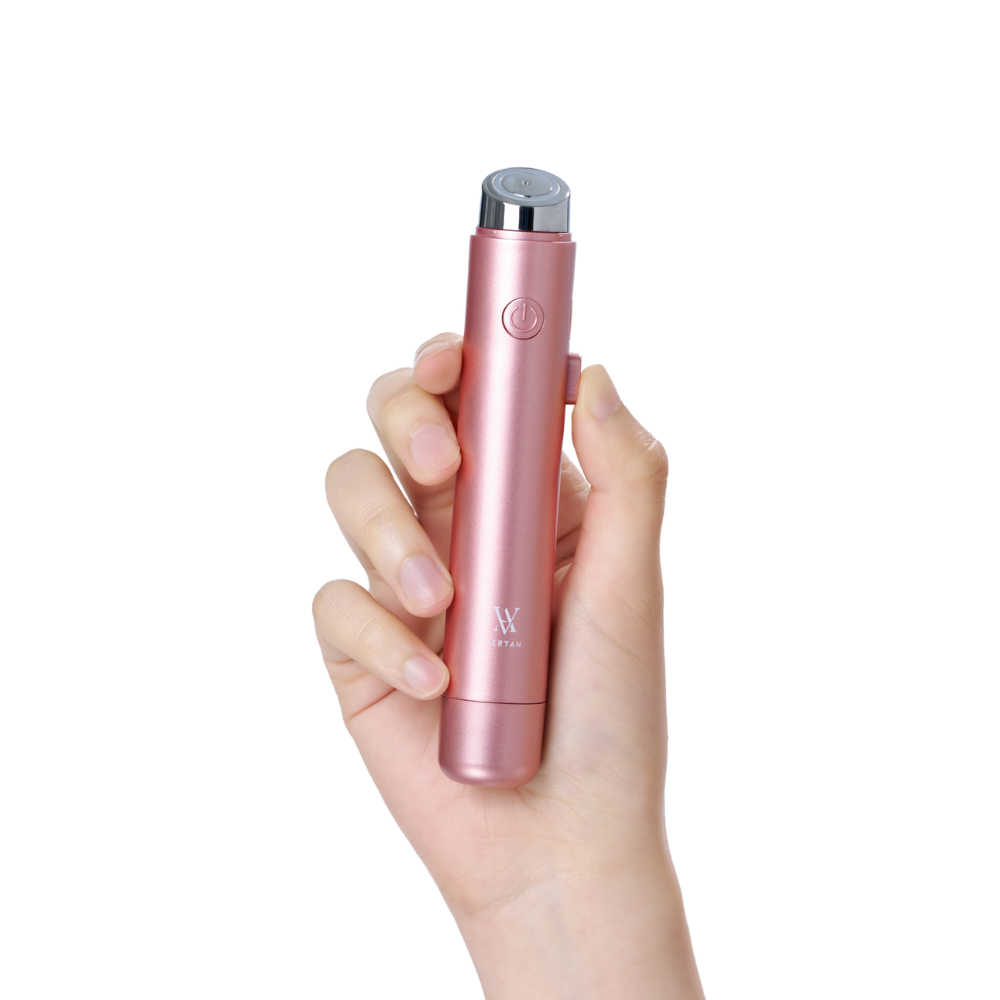 Compact and ergonomic VERYAN Serum Stick held in hand — a finished beauty device for immediate wholesale or OEM adaptation.